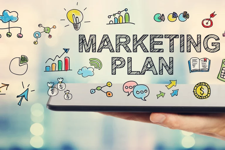 A hand holding a cell phone screen up with overlay graphic depicting marketing icons and words "marketing plan"